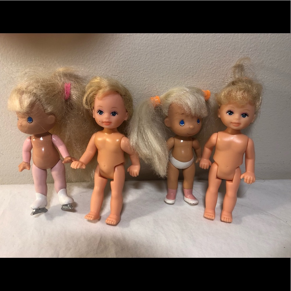 2 Rose Art 1996 Precious Moments Dolls, 1 skating & 2 bonus dolls